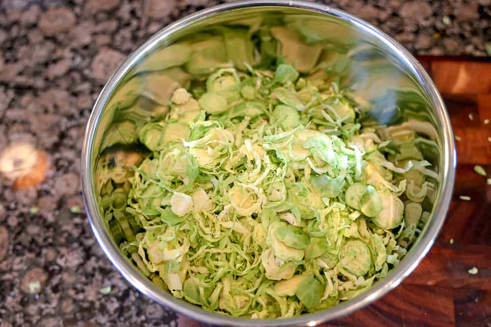 shredded Brussels sprouts on a cutting board