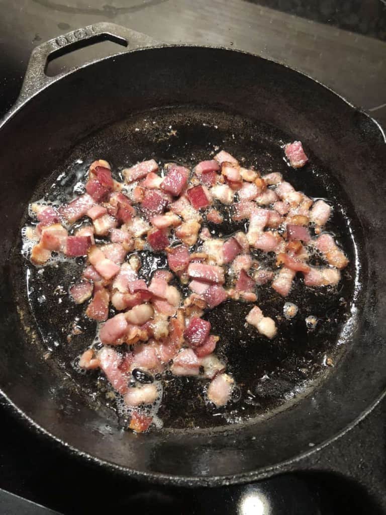 cooking up chopped bacon