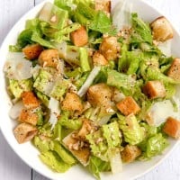 romain salad with croutons, parmesan cheese, and homemade vinaigrette