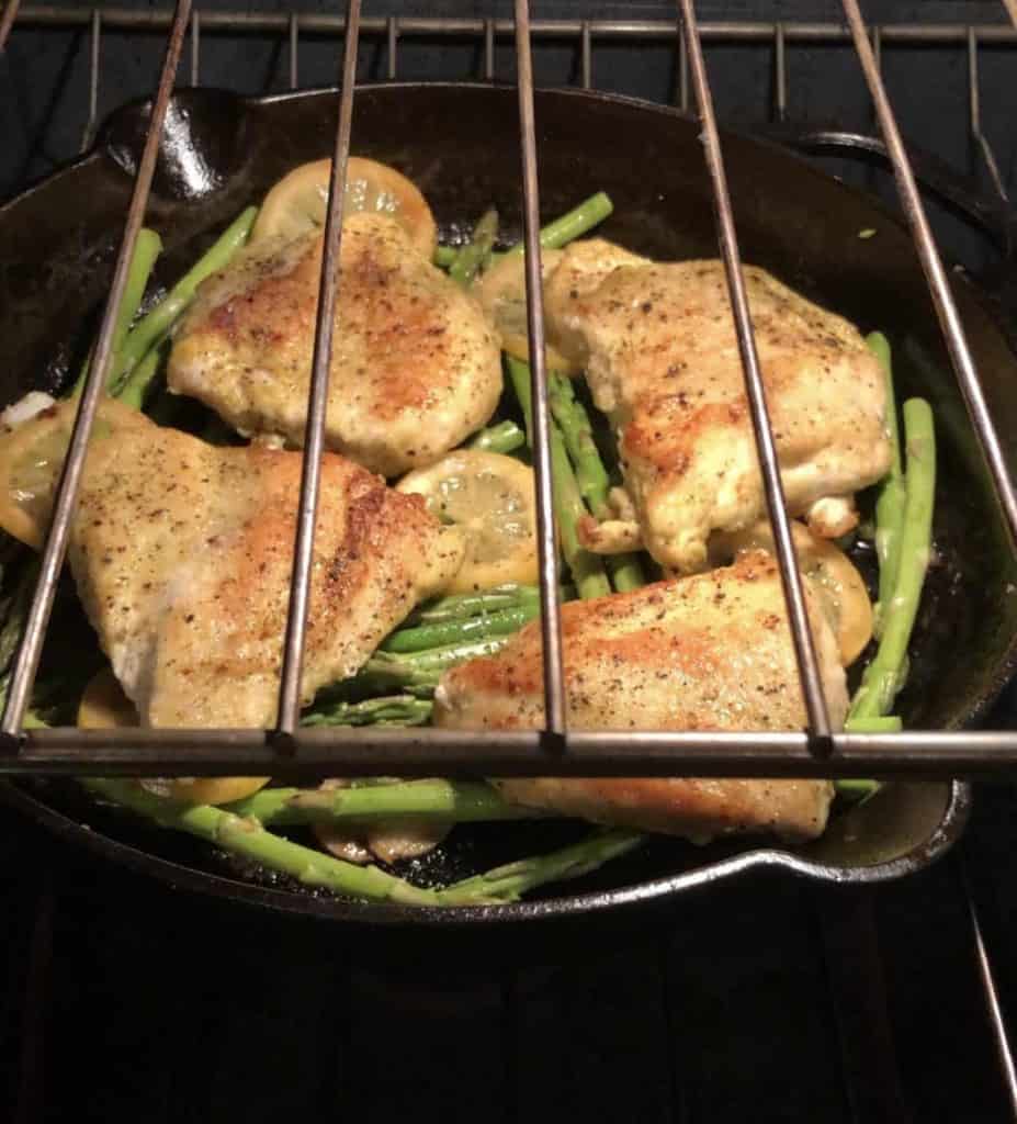chicken asparagus in oven with lemon slices