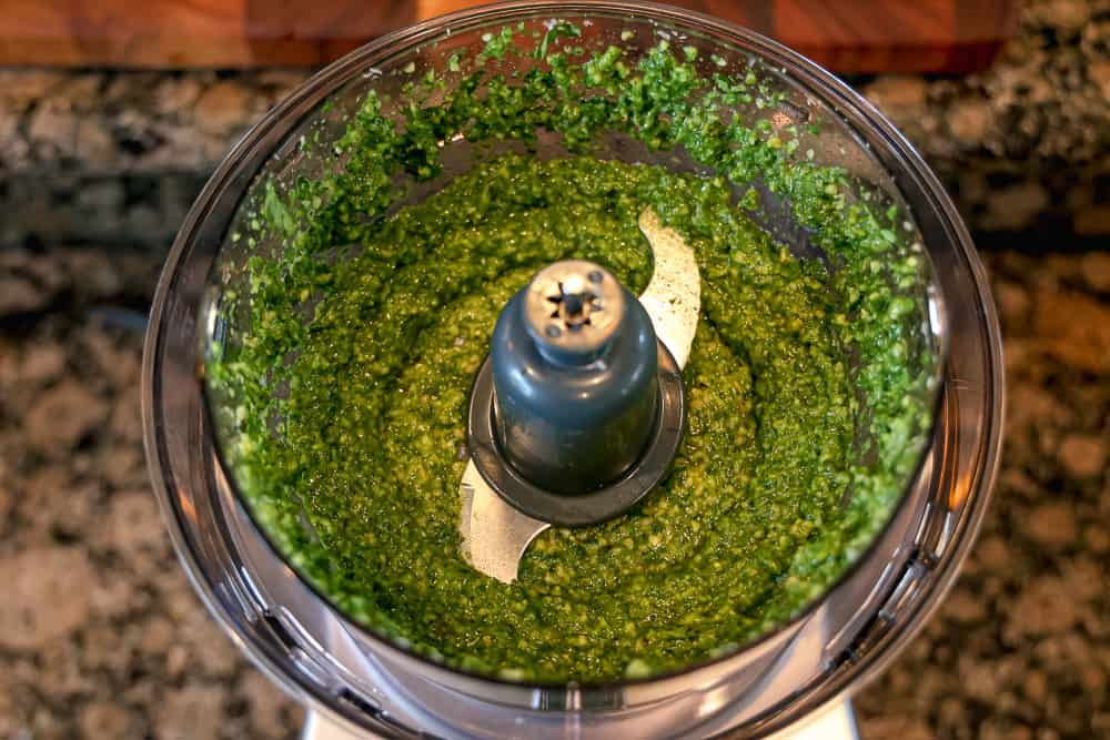 blended pesto in a food processor