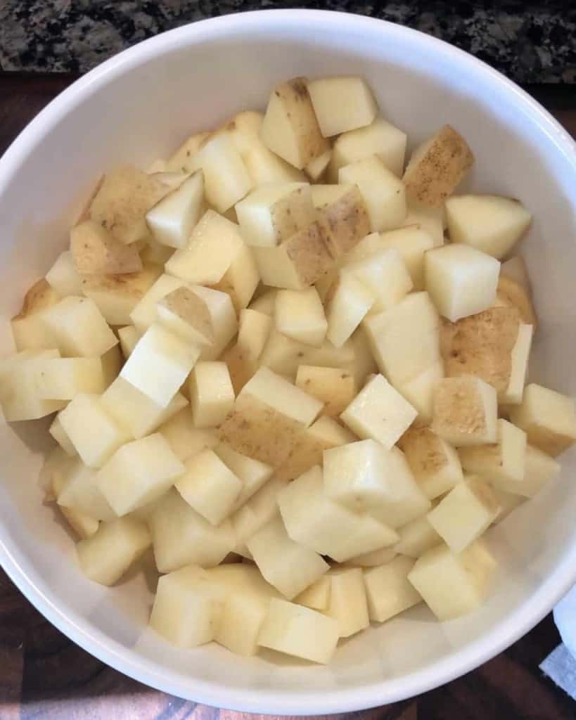 diced russet potatoes in a white bowl