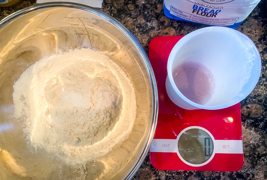 photo of bowl of flour and measuring scale on tabletop