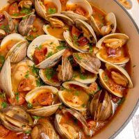 steamed clams in a white wine chorizo broth