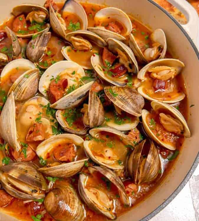 steamed clams in a white wine chorizo broth