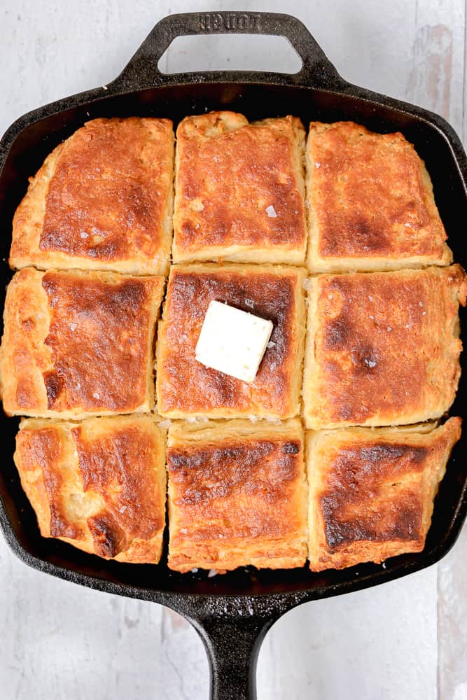 cast iron skillet with square buttermilk biscuits