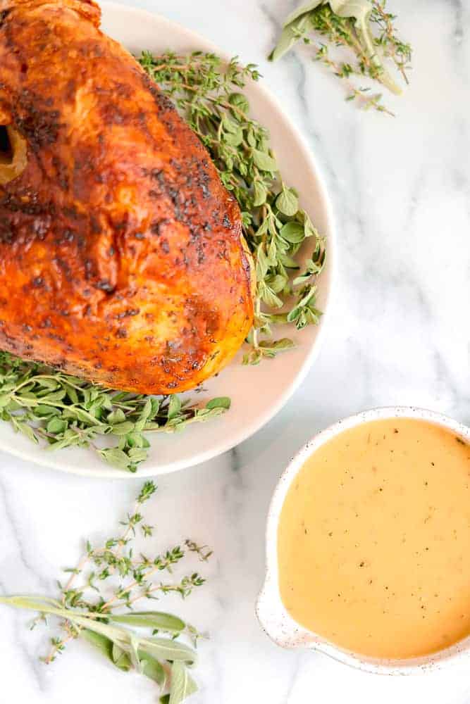 roasted turkey with homemade turkey gravy in a bowl 