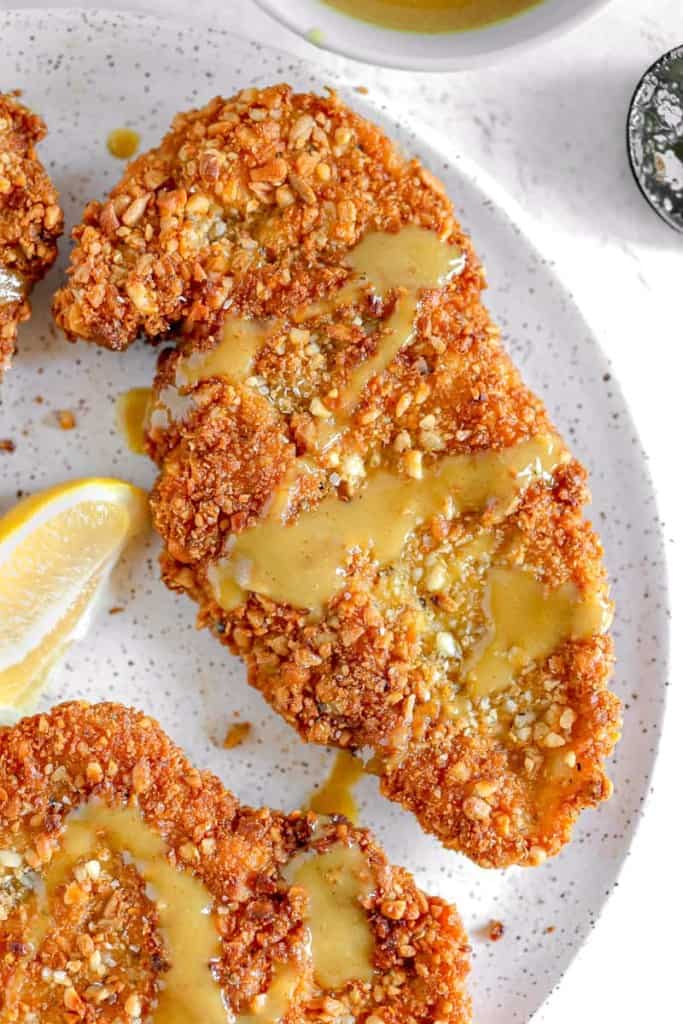 nut and seed crusted chicken with honey mustard drizzle