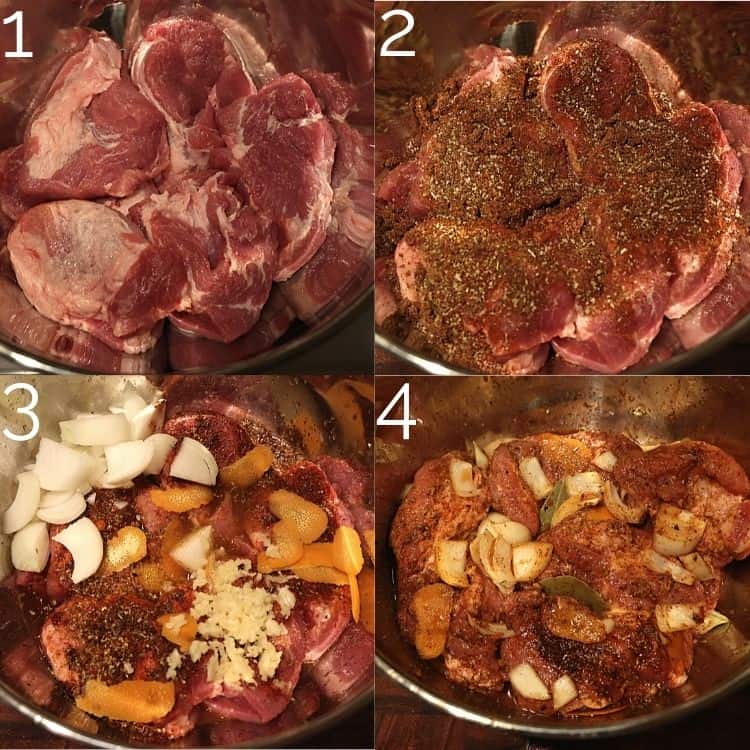 pork shoulder being mixed with spices, onion, orange peels, and garlic in a metal bowl