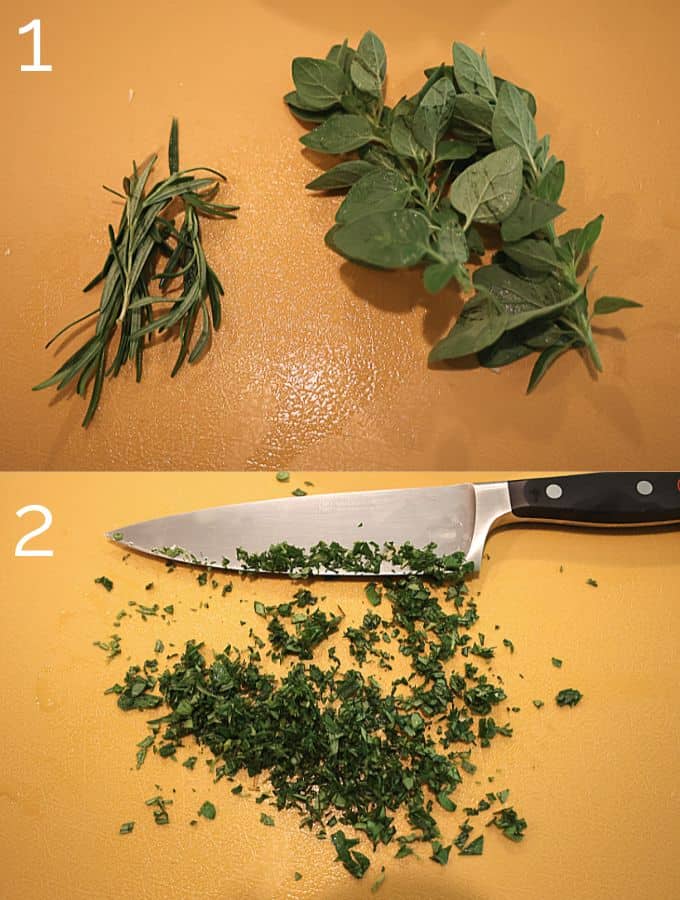 minced oregano and rosemary on a yellow cutting board