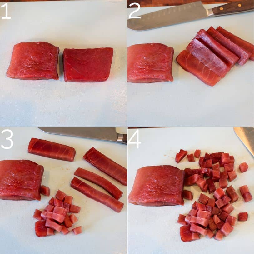 slicing sushi grade tuna on a white cutting board