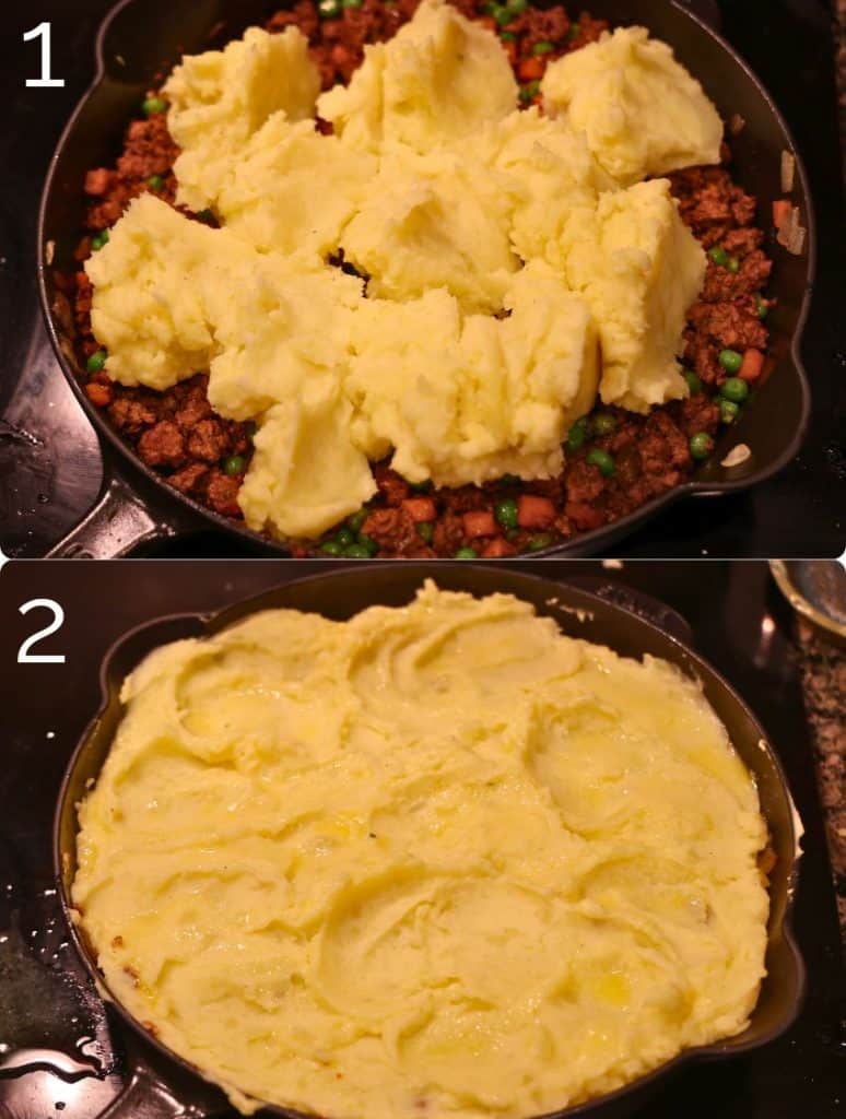 smoothing mashed potatoes over shepherds pie lamb stuffing in a cast iron skillet on the stovetop