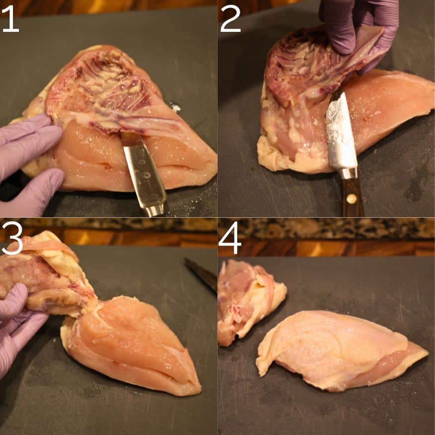 deboning a chicken with a knife on a grey cutting board