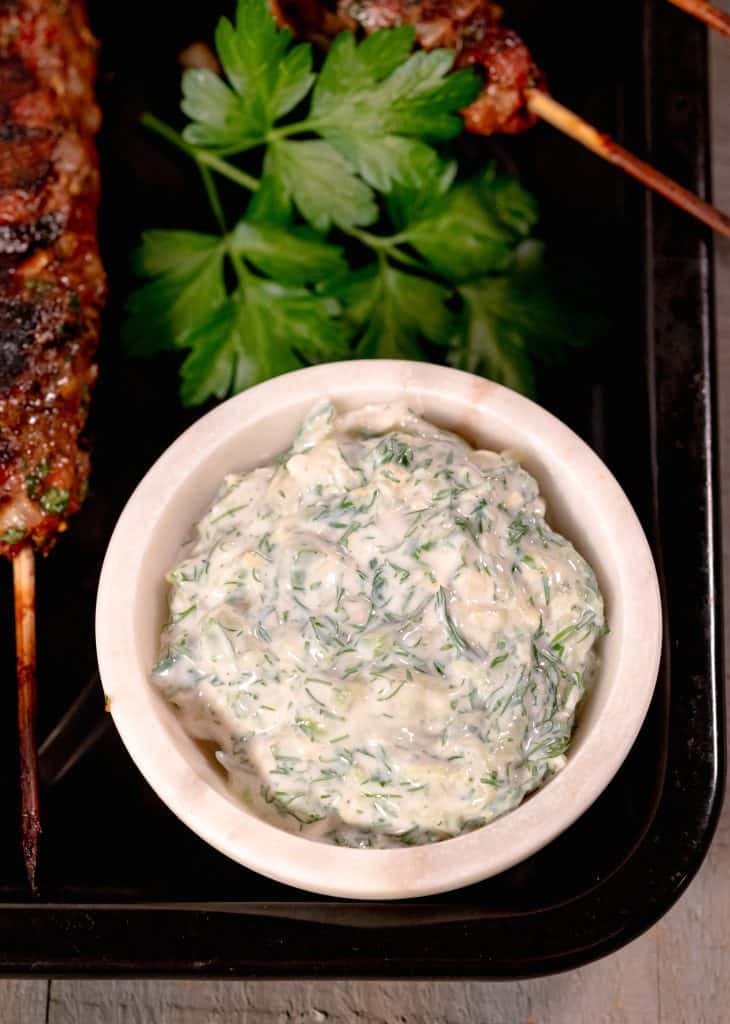 tzatziki sauce in a white bowl