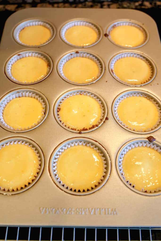 cooling key lime pies on a cooling rack on the stovetop